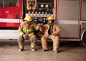 Two Firefighters in Fire Station