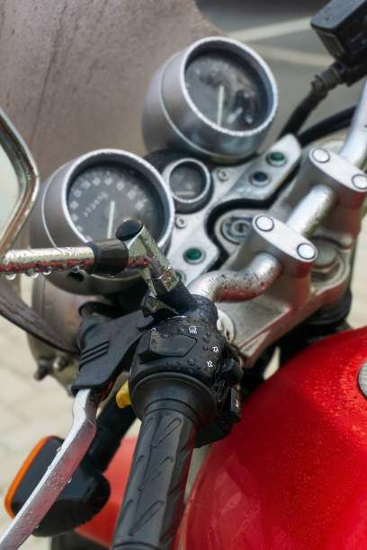istock Steering wheel and dashboard of a red classic motorcycle 1414689845