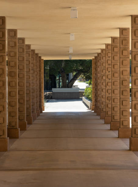 Symmetric outdoor corridor Claremont, CA - August 13 2022: outdoor corridor on the campus of Harvey Mudd College claremont california photos stock pictures, royalty-free photos & images