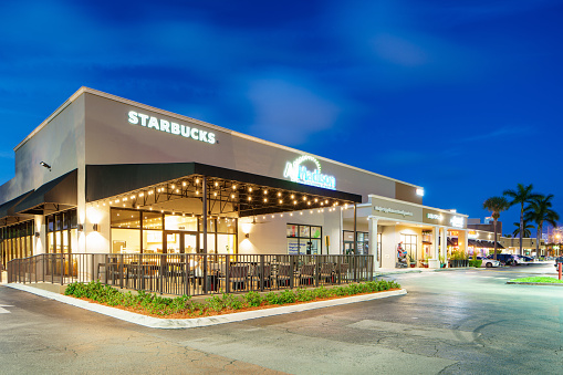 Miami, FL, USA - August 1, 2022: Night photo Starbucks Miami Sunny Isles Square