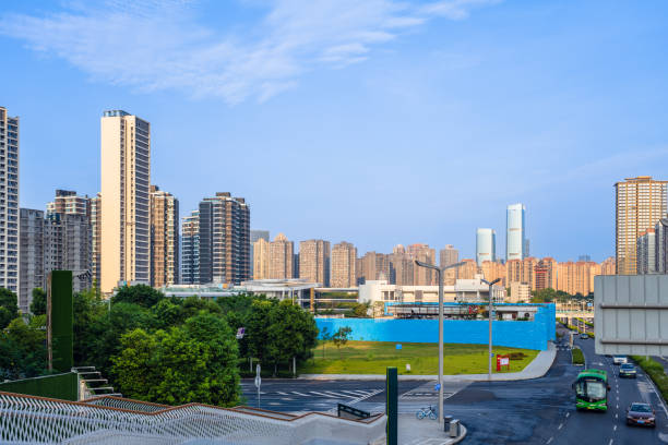 istock Sunny modern city and road 1414697582