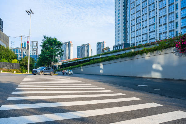 istock Sunny modern city and road 1414697675