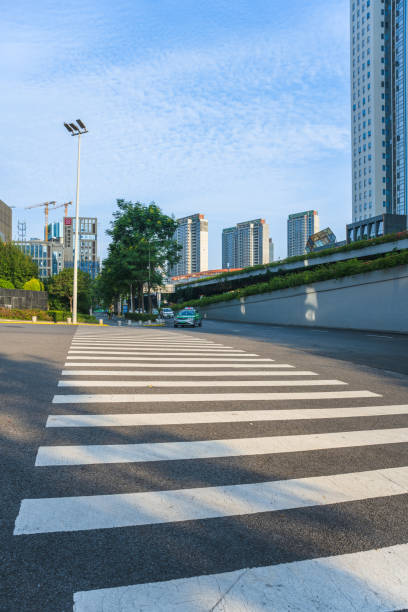 istock Sunny modern city and road 1414697679