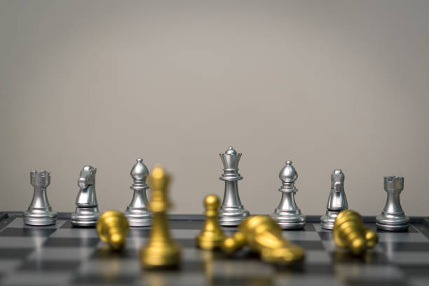 chess game stand on chessboard.Business strategy teamwork success investment concept.
