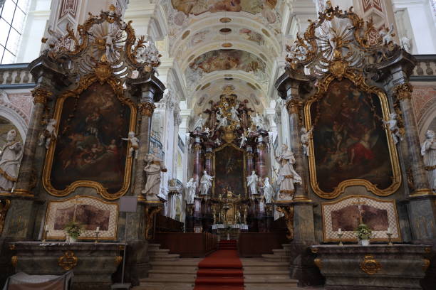 istock Golden catholic church altar, inside ancient catholic temple 1414700451