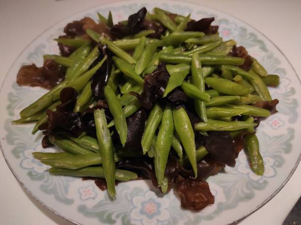istock Stir-fried chickpeas with ear mushrooms 1414706140
