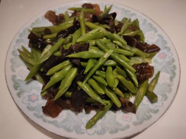 istock Stir-fried chickpeas with ear mushrooms 1414706145