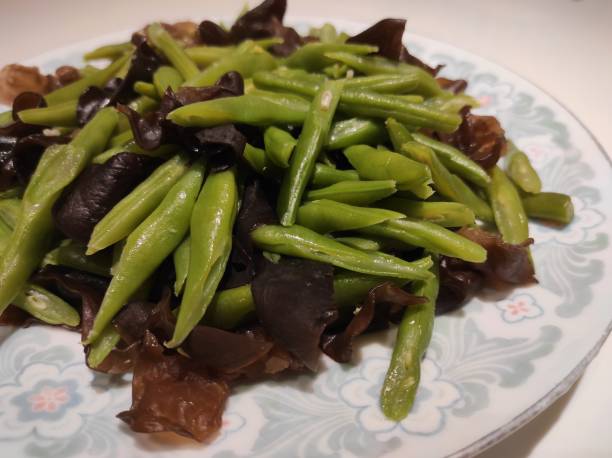 istock Stir-fried chickpeas with ear mushrooms 1414706152
