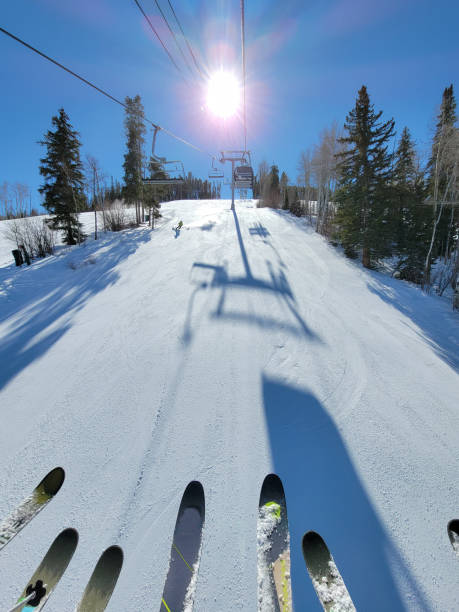 A skier flies over a jump.