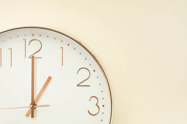 istock a wall clock that signals the hour 1414717144
