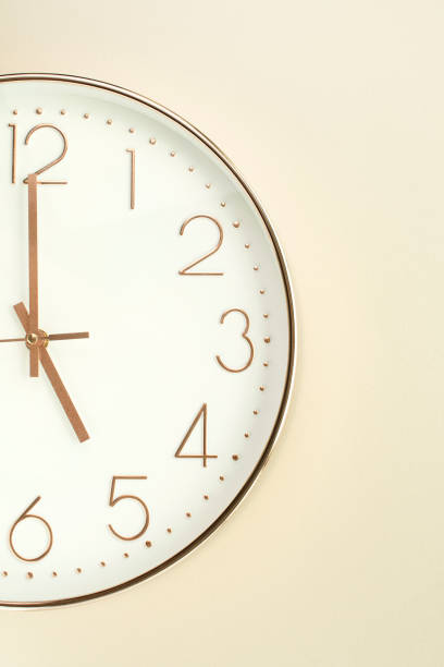 istock a wall clock that signals the hour 1414717154