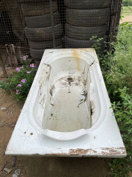 istock Old damaged bathtub in the outdoor 1414728026