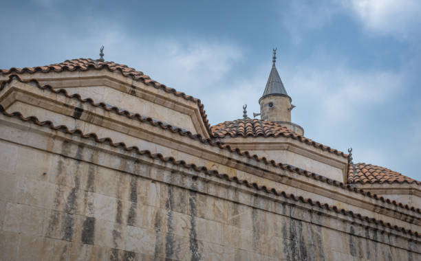 istock historical hasanaga mosque. tile dome and minaret. Adana, Turkey. 1414728909