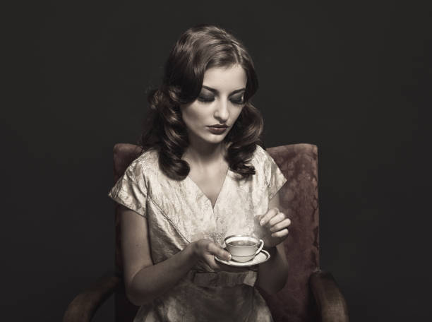 istock Retro woman drinking coffee 1414733088