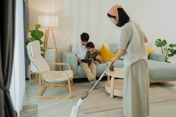 istock Asian family doing housework on holidays. 1414734802