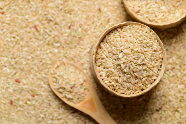 istock Thai brown rice seeds in bamboo basket, Organic rice 1414739026