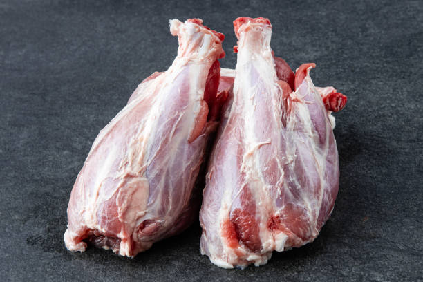 istock Pork ribs. Raw meat on a gray stne background 1414742631