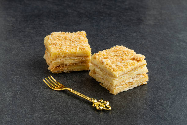 istock delicious Napoleon cake on stone table 1414744432