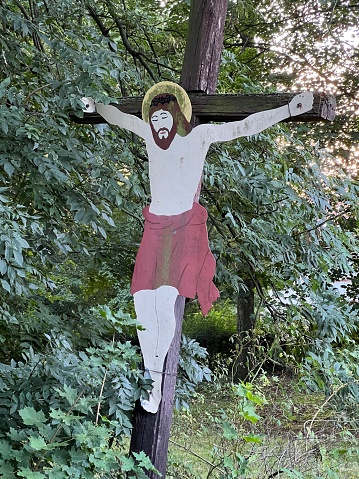 Crucifix in a forest