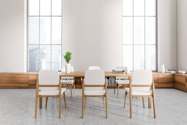 istock Light eating room interior with table and shelf, panoramic window and mockup 1414745584