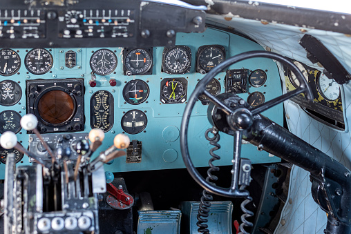 Old, vintage cockpit with sepia toning and vignette effect. 