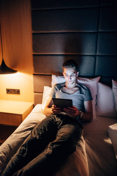 istock business man working in the hotel room 1414757853