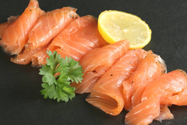 Smoked salmon smoked salmon slices smoked salmon stock pictures, royalty-free photos & images