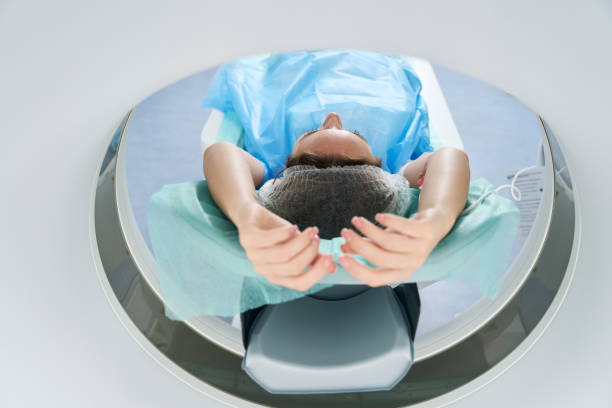 istock Patient is placed in the tomography chamber for computed tomography 1414762469