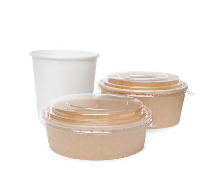Empty paper cup and bowls on white background. Containers for food