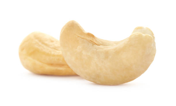 istock Tasty organic cashew nuts isolated on white 1414762855