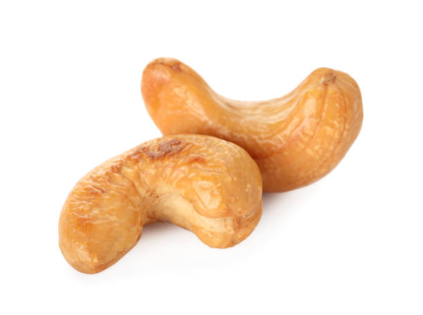 istock Tasty organic cashew nuts isolated on white 1414762996