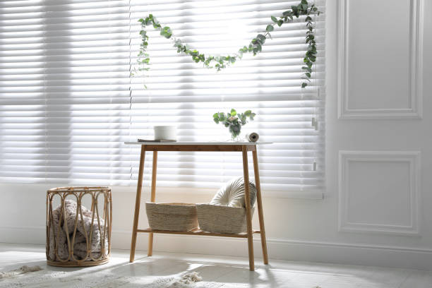 istock Stylish room decorated with beautiful eucalyptus garland 1414766389