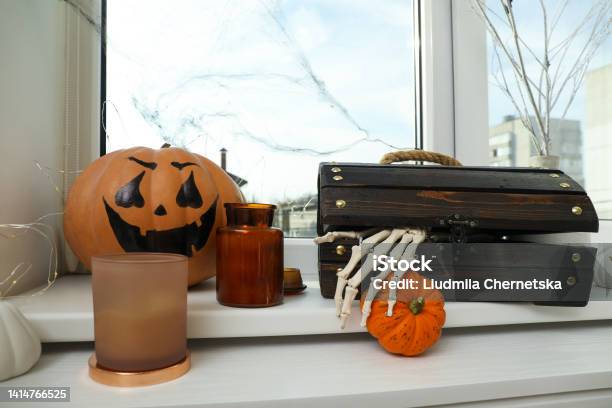 Different Halloween Decor On Windowsill Indoors Festive Interior Stock Photo - Download Image Now