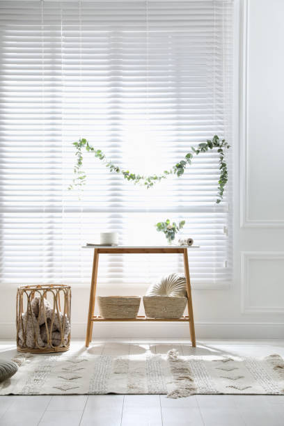 istock Stylish room decorated with beautiful eucalyptus garland 1414766557