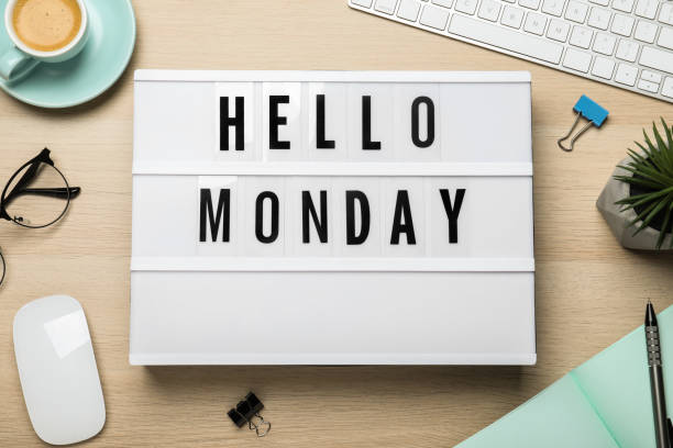 istock Flat lay composition of lightbox with phrase Hello Monday at workplace 1414766615