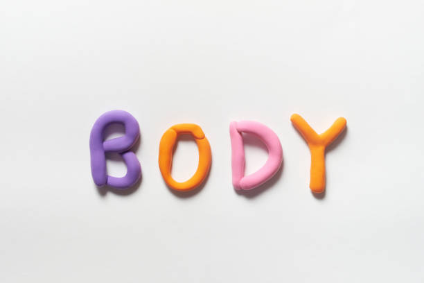 istock Body formed of colorful plasticine. 1414766705