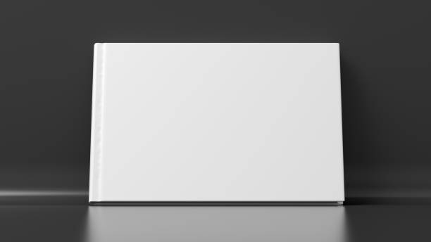 istock Blank horizontal hardcover book cover mockup standing on black background 1414767668