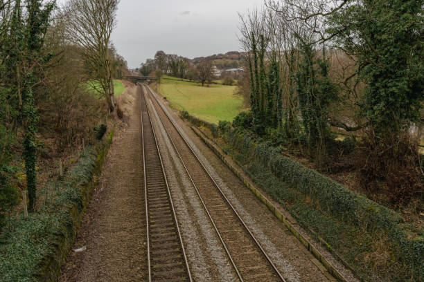 The view of the Midland Main Line, major railway line in England from London to Nottingham and Sheffield in the Midlands, near Milford village in Derbyshire, England.