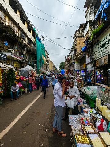 Fisheye shot of Masjid Bunder Market alleywayVertical Fisheye shot of Masjid Bunder Market alleyway, Mumbai, India. This shot is taken in the evening and a few days before Ganapati Festival.