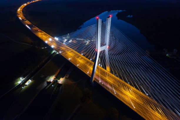 highway with the bridge at night (aerial) - wroclaw traffic night flowing imagens e fotografias de stock