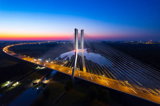 highway with the bridge at night (aerial) - wroclaw traffic night flowing imagens e fotografias de stock