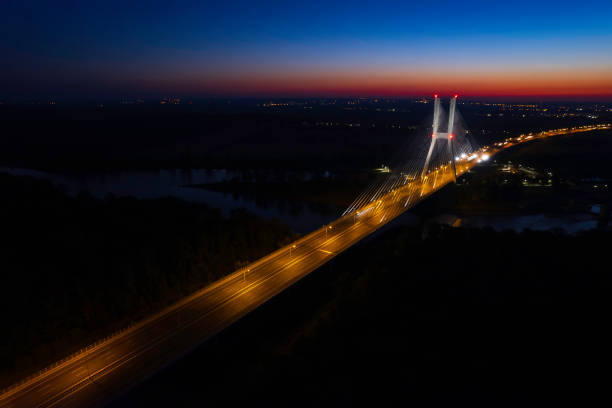 highway with the bridge at night (aerial) - wroclaw traffic night flowing imagens e fotografias de stock