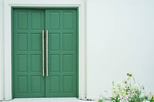 istock green wooden door background 1414780485