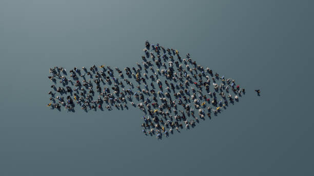 Arrow made of people standing on the ground