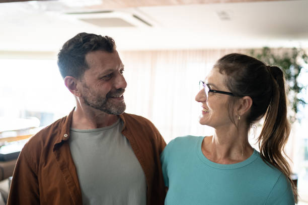 istock Couple at looking at each other at home 1414785231