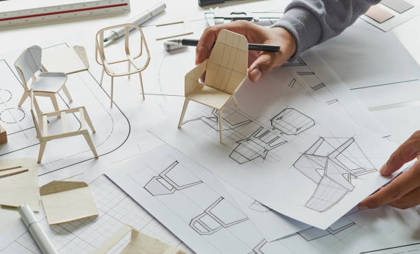 istock Designer sketching drawing design development product plan draft chair armchair Wingback Interior furniture prototype manufacturing production. designer studio concept . 1414787831
