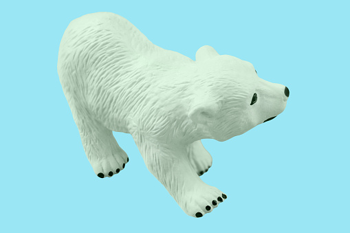 Ice Bear toy on blue background