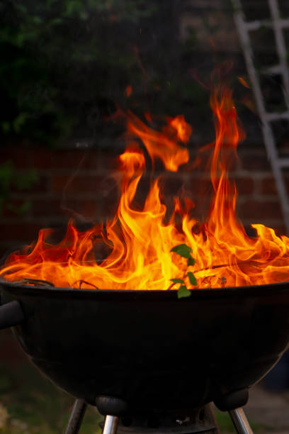 istock bright flame lights from a bonfire in the brazier 1414790952
