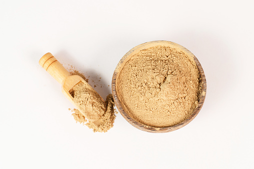 Healing earth powder in a bowl, supplement and antioxidant for to detox the body, alternative medicine