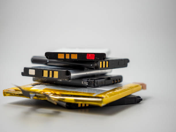 istock Old phone batteries. Replaceable batteries. Phone batteries. 1414793997